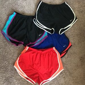 4 Pairs of Women’s Nike Dri-Fit Shirts